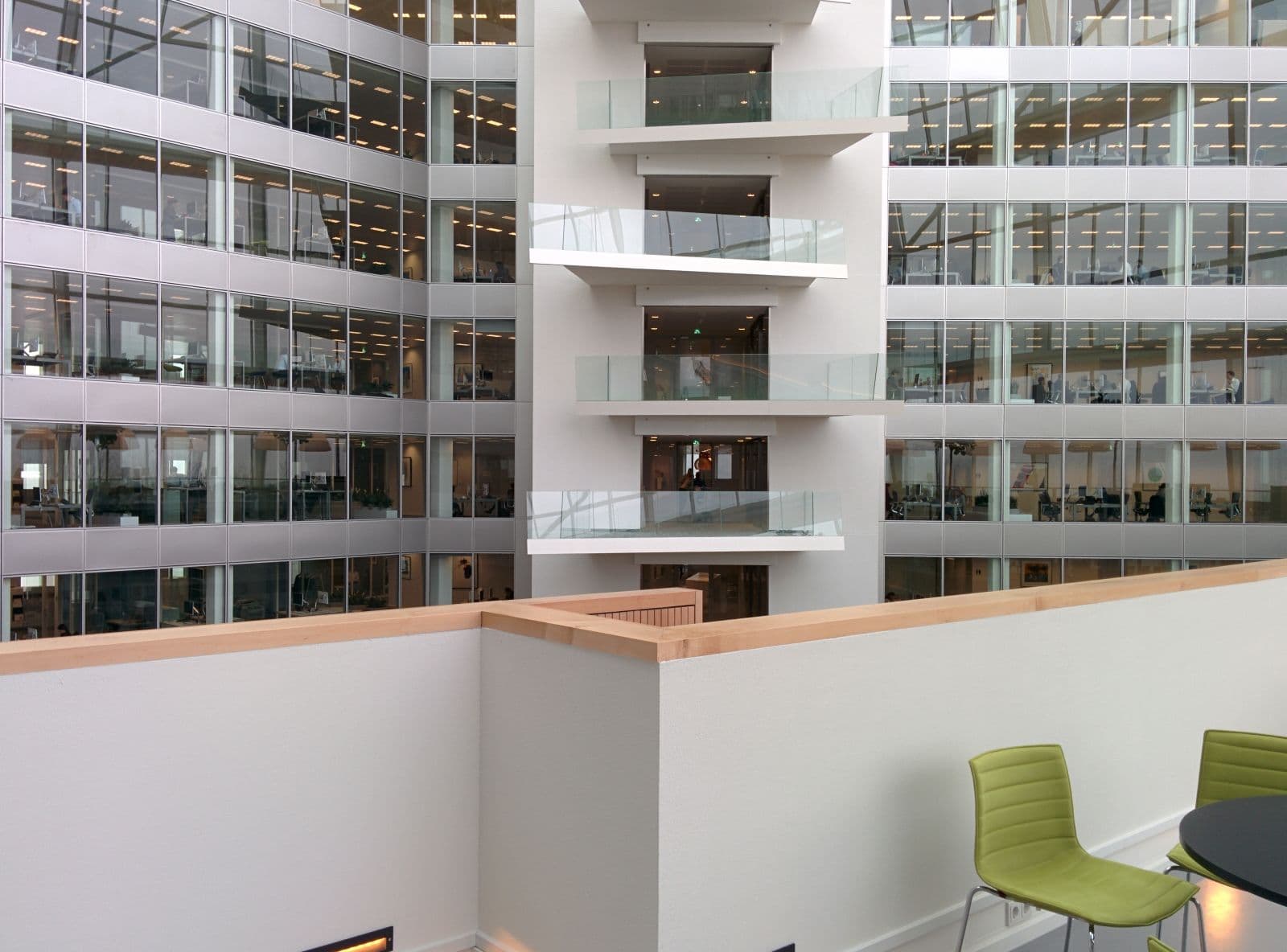 Modern enterprise office interior with collaboration spaces and network infrastructure