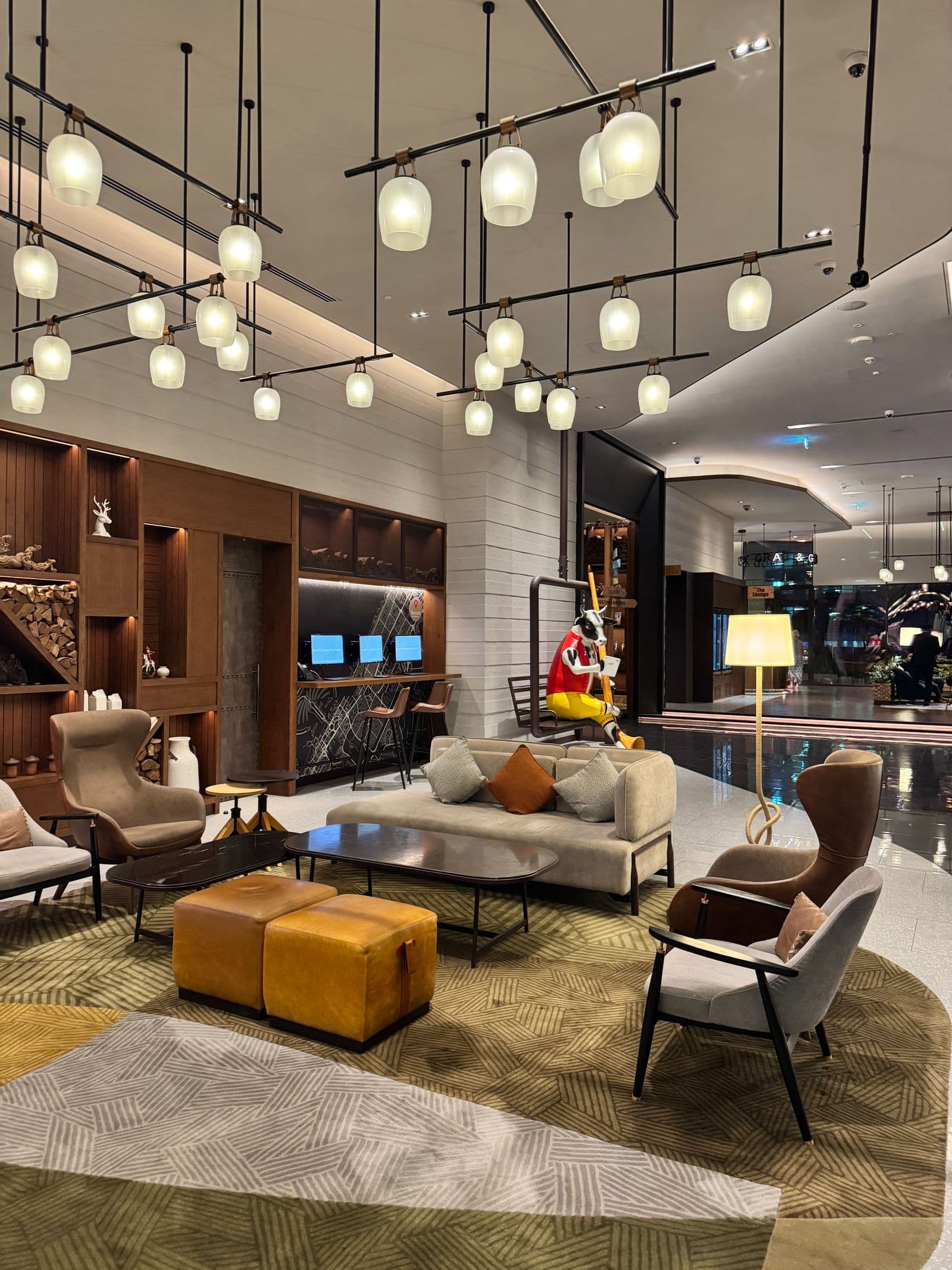 Hotel lobby interior with guest reception desk and adjoining event spaces