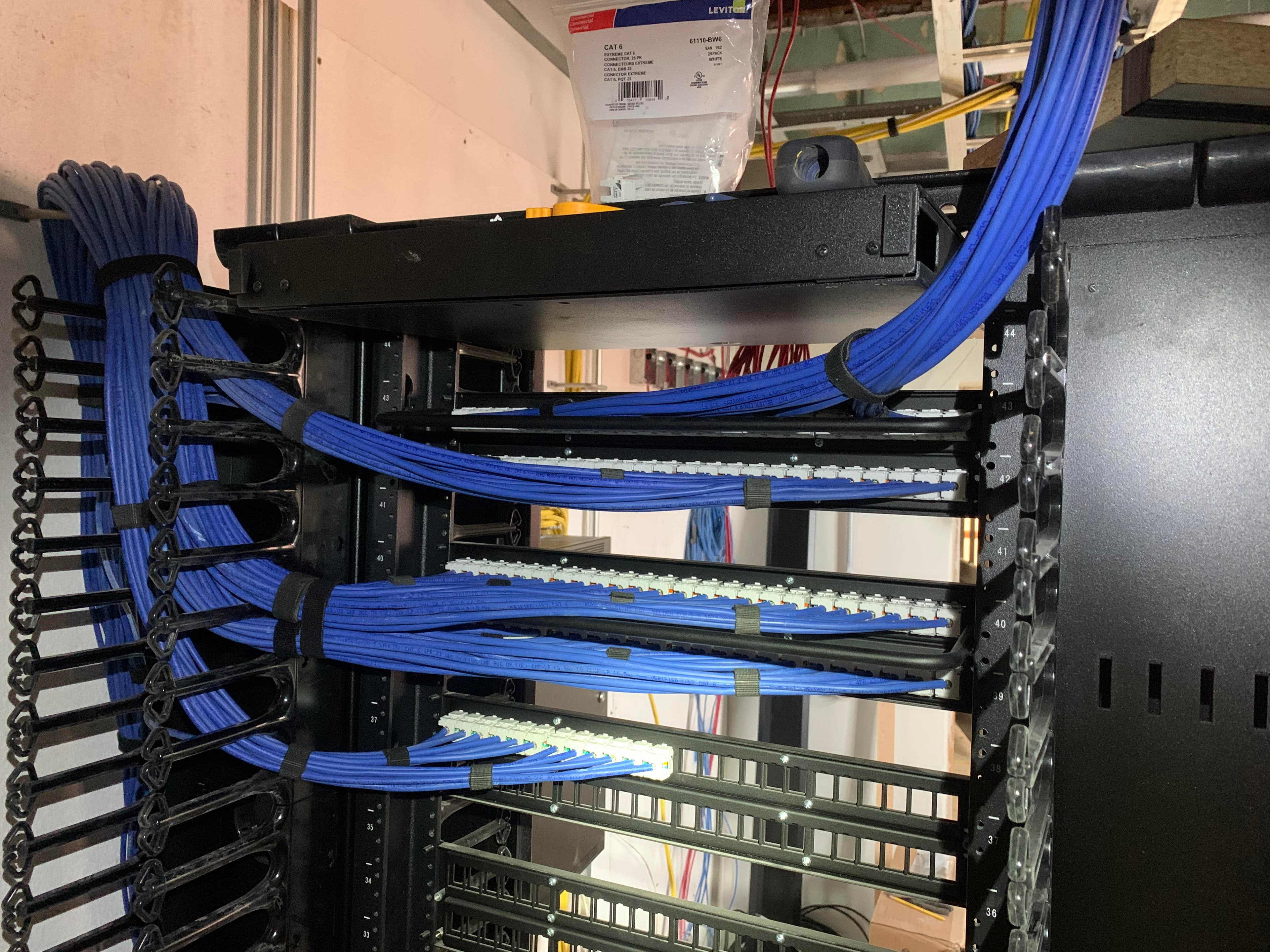 Structured Cabling: Cabling laid out so the network stays traceable — fiber runs for longer distances, every run documented from patch panel to outlet