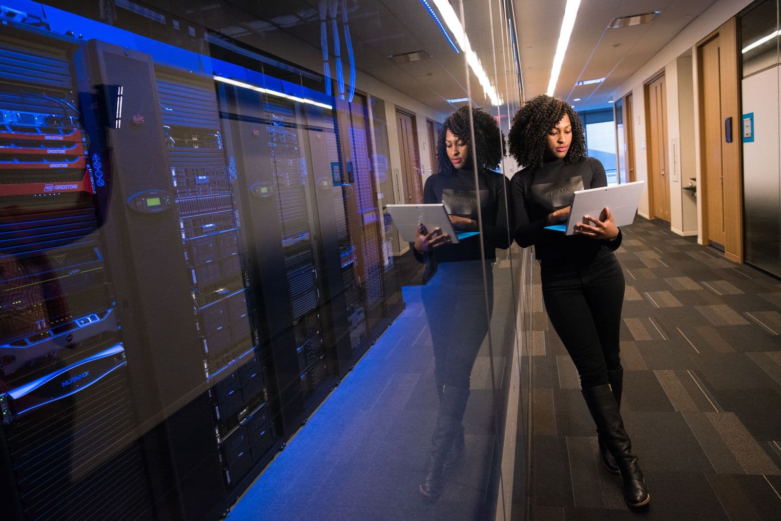 An IBS engineer monitoring infrastructure in a data center